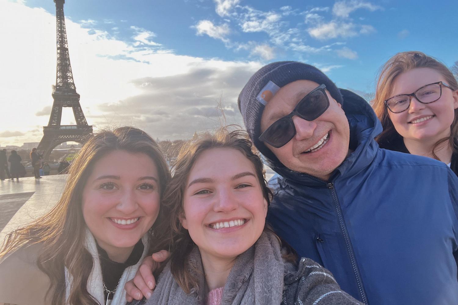 Professor Pascal Rollett (modern languages) and students on a Paris J-Term study tour.